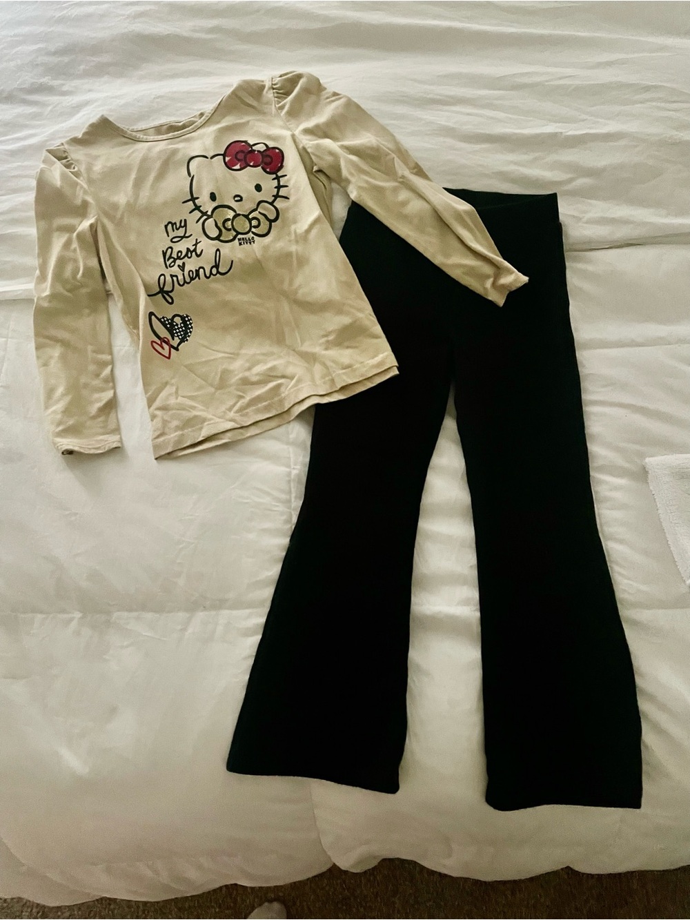 Hello Kitty Cream Top with Pink Bow and Black Pants